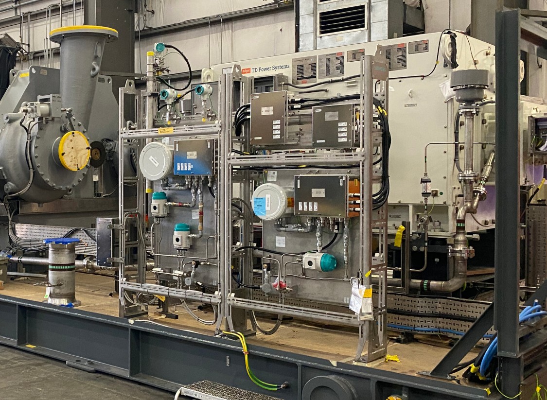Hybrid drive refridgeration package for NEC LNG project