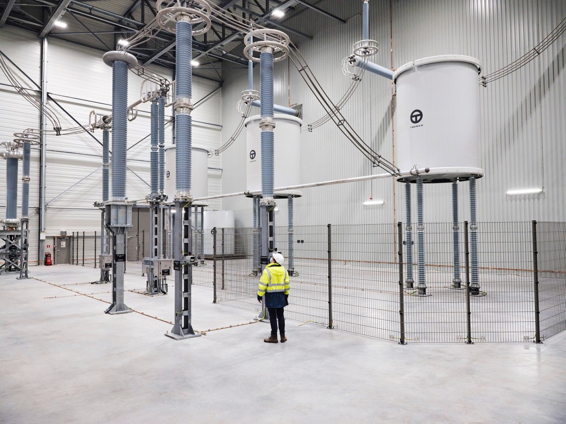 Siemens Energy engineer inspects the Nemolink converter station in Belgium.