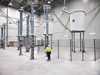 Siemens Energy engineer inspects the Nemolink converter station in Belgium.